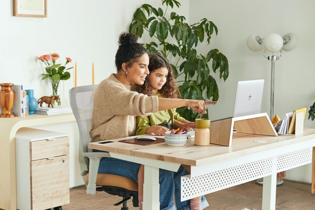 Mother and daughter in comfortable home